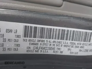 2012 Jeep Grand Cherokee Laredo with VIN 1C4RJFAG0CC156545, listed as a IAAI auction lot 41909296 with 170,033 mi miles. Bid and sale history available at carsss.com. Image 9.