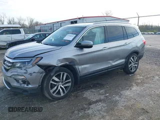 2016 Honda Pilot Touring with VIN 5FNYF6H90GB024902, listed as a IAAI auction lot 41948563 with 148,598 mi miles. Bid and sale history available at carsss.com. Image 22.