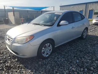 2009 Hyundai Elantra SE with VIN KMHDU46D79U699197, listed as a Copart auction lot 61804645 with 151,546 mi miles and Salvage title. Bid and sale history available at DreamBid. Image 1.