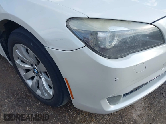 2011 BMW 7 Series 750Li with VIN WBAKB8C57BCY66558, listed as a IAAI auction lot 41494697 with 102,560 mi miles. Bid and sale history available at carsss.com. Image 12.