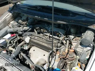 1997 Honda Odyssey LX z VIN JHMRA1863VC016233, wystawiony jako IAAI lot #42415705 z przebiegiem 93 271 mil mil oraz . Historia ofert i sprzedaży dostępna na DreamBid. Obrazek 13.