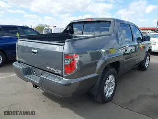 2013 Honda Ridgeline RTS with VIN 5FPYK1F4XDB016430, listed as a IAAI auction lot 41711524 with 132,185 mi miles. Bid and sale history available at carsss.com. Image 4.