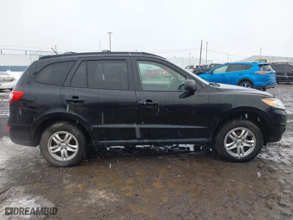 2012 Hyundai Santa Fe GLS with VIN 5XYZG3ABXCG159336, listed as a IAAI auction lot 41635699 with 128,975 mi miles. Bid and sale history available at carsss.com. Image 13.