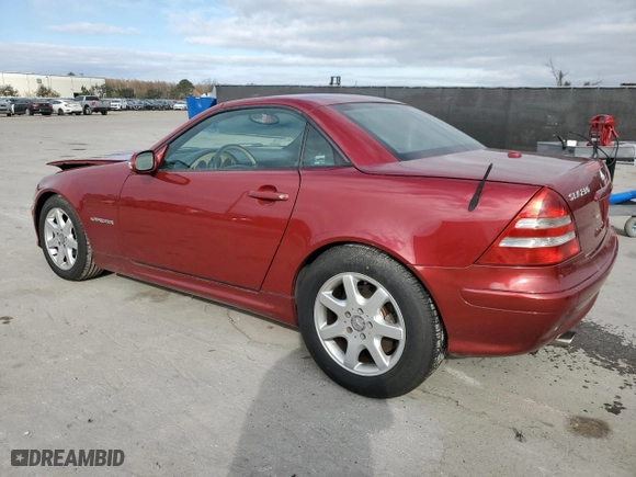 2001 Mercedes-Benz SLK-Class Kompressor with VIN WDBKK49F01F223928, listed as a Copart auction lot 87061404 with 102,270 mi miles and Salvage Title. Bid and sale history available at carsss.com. Image 2.