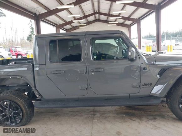 2022 Jeep Gladiator Overland with VIN 1C6HJTFG2NL114648, listed as a IAAI auction lot 41710064 with 62,453 mi miles. Bid and sale history available at carsss.com. Image 14.
