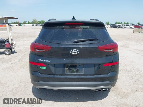 2021 Hyundai Tucson Ultimate with VIN KM8J33ALXMU289579, listed as a IAAI auction lot 42027719 with 95,989 mi miles and . Bid and sale history available at DreamBid. Image 16.