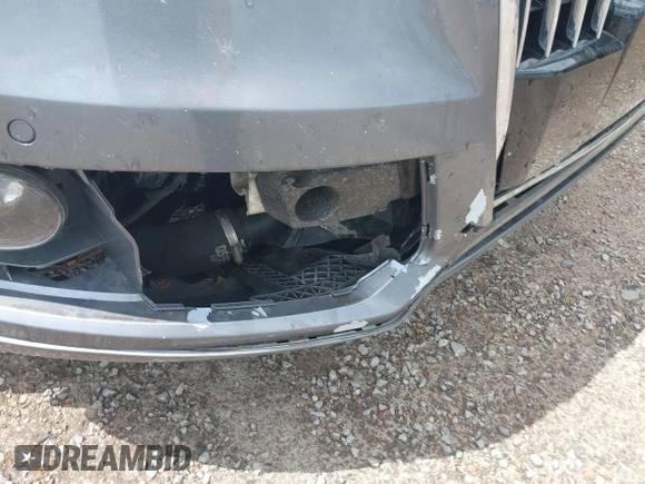 2013 Audi Q5 Premium Plus with VIN WA1LFAFP1DA061034, listed as a IAAI auction lot 41946491 with 119,496 mi miles and . Bid and sale history available at DreamBid. Image 12.