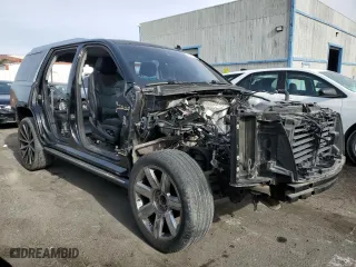 2015 Cadillac Escalade Premium with VIN 1GYS3CKJ0FR273896, listed as a Copart auction lot 84371124 with 60,569 mi miles and Salvage Title. Bid and sale history available at carsss.com. Image 4.