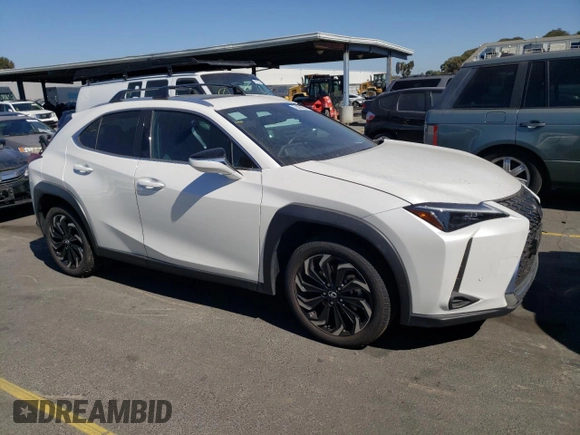 2024 Lexus UX with VIN JTHX6JBH3R2187983, listed as a Copart auction lot 73429324 with 14,549 mi miles and Salvage Title. Bid and sale history available at carsss.com. Image 4.