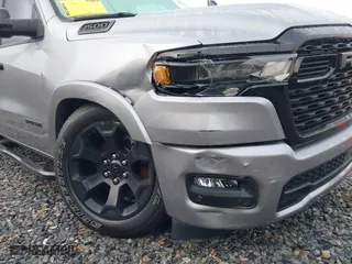2025 Ram 1500 Big Horn with VIN 1C6SRFFP5SN502795, listed as a IAAI auction lot 41498981 with 6,565 mi miles. Bid and sale history available at carsss.com. Image 6.