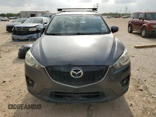 2015 Mazda CX-5 Touring with VIN JM3KE4CY0F0517821, listed as a Copart auction lot 53937195 with 165,852 mi miles and Salvage Title. Bid and sale history available at DreamBid. Image 5.