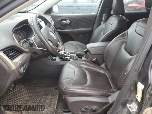2015 Jeep Cherokee Trailhawk with VIN 1C4PJMBB6FW574108, listed as a Copart auction lot 57798475 with 105,022 mi miles and Salvage title. Bid and sale history available at DreamBid. Image 7.