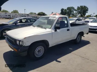 1993 Toyota Pickup with VIN 4TARN81AXPZ052929, listed as a Copart auction lot 57418895 with 329,073 mi miles and Salvage title. Bid and sale history available at DreamBid. Image 1.