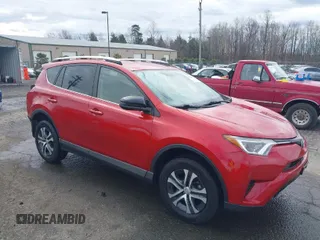 2016 Toyota RAV4 LE with VIN JTMBFREV2GJ097058, listed as a IAAI auction lot 41720372 with 118,606 mi miles. Bid and sale history available at carsss.com. Image 1.