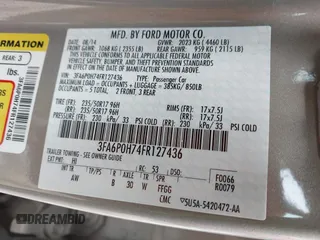 2015 Ford Fusion SE z VIN 3FA6P0H74FR127436, wystawiony jako IAAI lot #42040853 z przebiegiem 164 170 mil mil oraz . Historia ofert i sprzedaży dostępna na DreamBid. Obrazek 9.