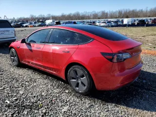 2022 Tesla Model 3 with VIN 5YJ3E1EA5NF184785, listed as a Copart auction lot 49466575 with 85,273 mi miles and Salvage Title. Bid and sale history available at DreamBid. Image 2.