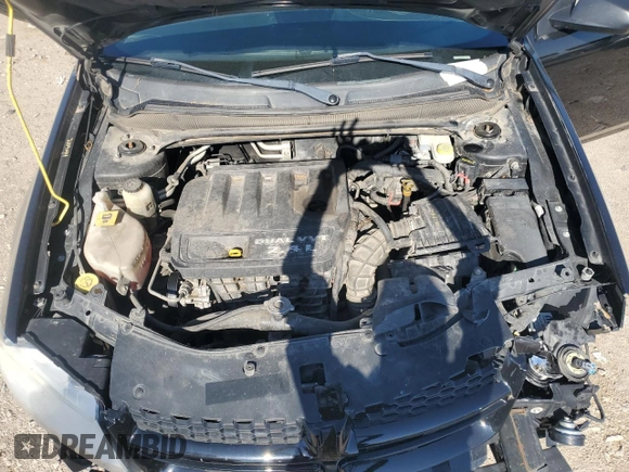 2014 Dodge Avenger SE z VIN 1C3CDZAB0EN222185, wystawiony jako Copart lot #55468775 z przebiegiem 222 601 mil mil oraz Szkoda całkowita • Salvage title. Historia ofert i sprzedaży dostępna na DreamBid. Obrazek 11.