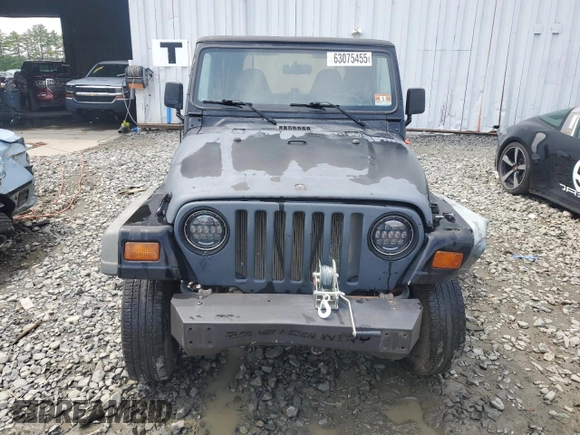 1999 Jeep Wrangler SE z VIN 1J4FY29P0XP479580, wystawiony jako Copart lot #63075455 z przebiegiem 160 986 mil mil oraz Szkoda całkowita • Salvage title. Historia ofert i sprzedaży dostępna na DreamBid. Obrazek 5.