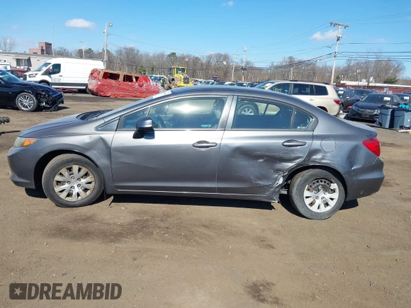 2012 Honda Civic LX z VIN 19XFB2F52CE329264, wystawiony jako IAAI lot #41654894 z przebiegiem 110 836 mil mil oraz . Historia ofert i sprzedaży dostępna na DreamBid. Obrazek 14.