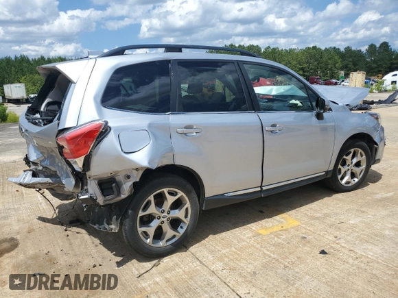 2017 Subaru Forester Touring with VIN JF2SJAWC9HH565195, listed as a Copart auction lot 61631195 with 40,715 mi miles and Salvage title. Bid and sale history available at DreamBid. Image 3.