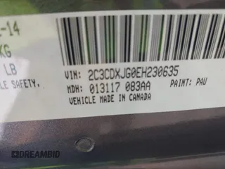 2014 Dodge Charger SXT Plus with VIN 2C3CDXJG0EH230635, listed as a IAAI auction lot 41890555 with 203,869 mi miles. Bid and sale history available at carsss.com. Image 9.