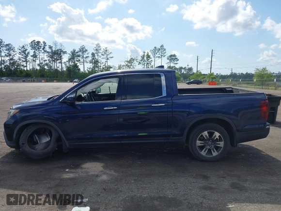 2019 Honda Ridgeline RTL-E with VIN 5FPYK3F76KB010613, listed as a IAAI auction lot 42079810 with 90,492 mi miles and . Bid and sale history available at DreamBid. Image 14.