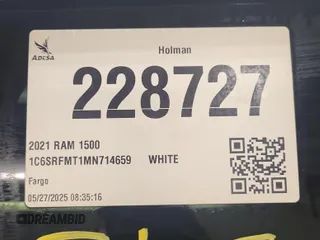 2021 Ram 1500 Big Horn z VIN 1C6SRFMT1MN714659, wystawiony jako IAAI lot #42521058 z przebiegiem 126 678 mil mil oraz . Historia ofert i sprzedaży dostępna na DreamBid. Obrazek 13.