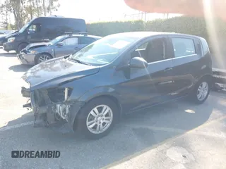 2014 Chevrolet Sonic LT with VIN 1G1JC6SG4E4118781, listed as a IAAI auction lot 41862192 with 124,375 mi miles. Bid and sale history available at carsss.com. Image 2.