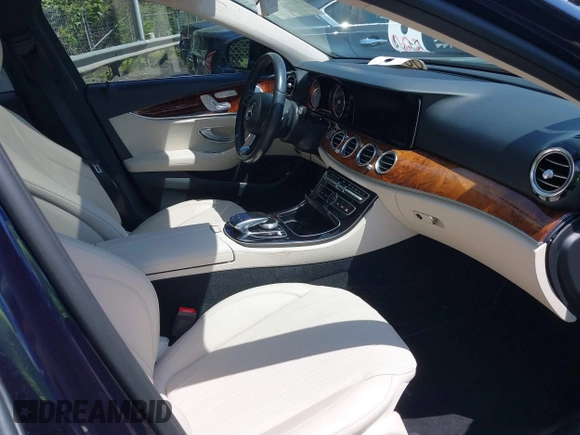 2018 Mercedes-Benz E-Class E 300 with VIN WDDZF4JBXJA369186, listed as a IAAI auction lot 42016149 with 59,360 mi miles. Bid and sale history available at carsss.com. Image 5.
