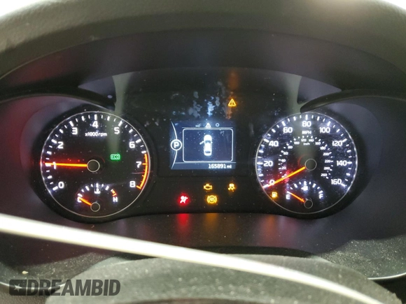 2016 Kia Optima LX z VIN 5XXGT4L3XGG088048, wystawiony jako Copart lot #56802395 z przebiegiem 165 891 mil mil oraz Szkoda całkowita • Salvage title. Historia ofert i sprzedaży dostępna na DreamBid. Obrazek 9.