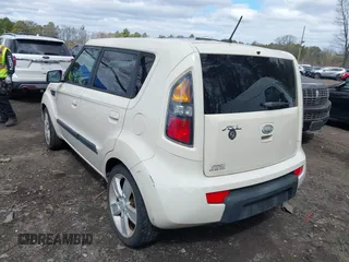 2010 Kia Soul + with VIN KNDJT2A2XA7034348, listed as a IAAI auction lot 42059954 with 252,878 mi miles. Bid and sale history available at carsss.com. Image 6.