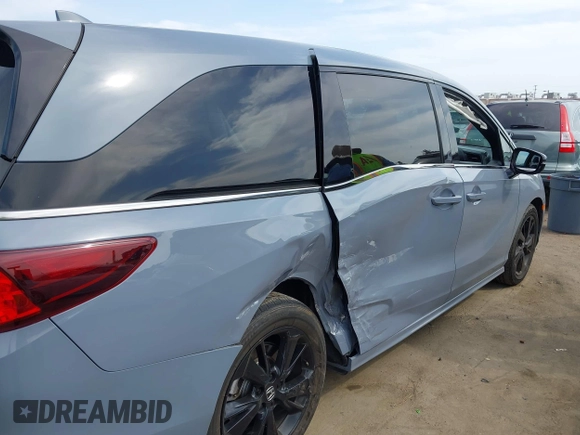 2023 Honda Odyssey Sport z VIN 5FNRL6H72PB031975, wystawiony jako IAAI lot #42047457 z przebiegiem 34 886 mil mil oraz . Historia ofert i sprzedaży dostępna na DreamBid. Obrazek 6.