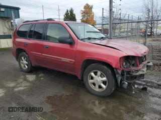 2004 GMC Envoy SLT with VIN 1GKDT13S942237743, listed as a Copart auction lot 85452894 with 192,043 mi miles and Salvage Title. Bid and sale history available at carsss.com. Image 4.