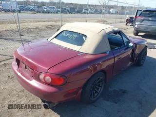 2003 Mazda MX-5 Miata Cloth with VIN JM1NB353730302782, listed as a IAAI auction lot 41751970 with 109,336 mi miles and . Bid and sale history available at DreamBid. Image 4.