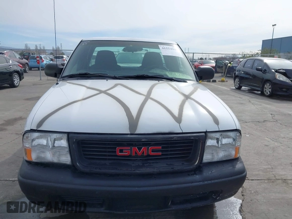 2003 GMC Sonoma SLS z VIN 1GTCS19X438272277, wystawiony jako IAAI lot #41554041 z przebiegiem 168 682 mil mil oraz . Historia ofert i sprzedaży dostępna na DreamBid. Obrazek 12.