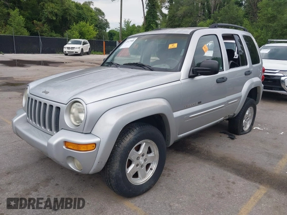 2002 Jeep Liberty Limited with VIN 1J4GL58K42W232295, listed as a IAAI auction lot 42617908 with 215,611 mi miles and . Bid and sale history available at DreamBid. Image 2.