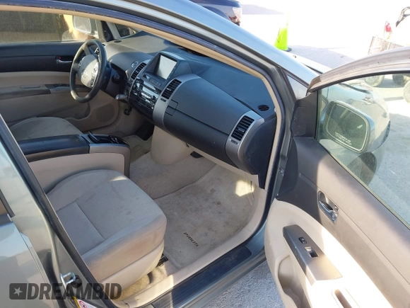 2004 Toyota Prius with VIN JTDKB20U640034581, listed as a IAAI auction lot 41895908 with 213,708 mi miles. Bid and sale history available at carsss.com. Image 5.