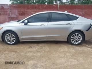 2020 Ford Fusion SE z VIN 3FA6P0LU4LR148070, wystawiony jako IAAI lot #42262446 z przebiegiem 69 057 mil mil oraz . Historia ofert i sprzedaży dostępna na DreamBid. Obrazek 14.