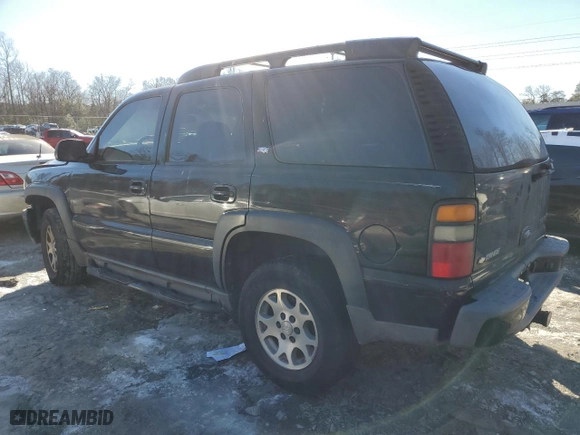 2005 Chevrolet Tahoe Z71 with VIN 1GNEK13T45R153826, listed as a Copart auction lot 87712455 with 244,533 mi miles and Salvage Title. Bid and sale history available at carsss.com. Image 2.