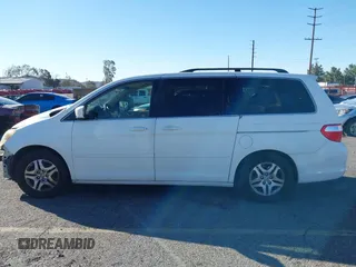 2006 Honda Odyssey EX z VIN 5FNRL38486B410286, wystawiony jako IAAI lot #41641433 z przebiegiem 145 312 mil mil oraz . Historia ofert i sprzedaży dostępna na DreamBid. Obrazek 14.