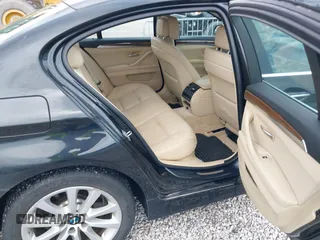 2013 BMW 5 Series 528i xDrive with VIN WBAXH5C50DD108058, listed as a IAAI auction lot 41874340 with 146,054 mi miles. Bid and sale history available at carsss.com. Image 8.