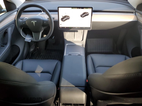 2024 Tesla Model Y Long Range with VIN 7SAYGDEE4RA299503, listed as a Copart auction lot 61950585 with 17,077 mi miles and Salvage title. Bid and sale history available at DreamBid. Image 8.