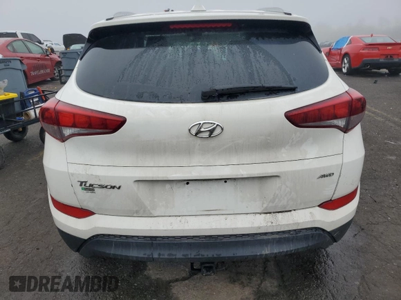 2018 Hyundai Tucson SEL with VIN KM8J3CA41JU712523, listed as a Copart auction lot 56929885 with 91,131 mi miles and Salvage title. Bid and sale history available at DreamBid. Image 6.