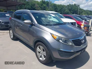 2013 Kia Sportage LX with VIN KNDPB3A21D7406277, listed as a IAAI auction lot 42612032 with 150,041 mi miles and . Bid and sale history available at DreamBid. Image 1.