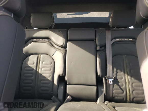 2024 Rivian R1S Adventure z VIN 7PDSGABA6RN033514, wystawiony jako Copart lot #89296455 z przebiegiem Nie podano mil oraz Szkody całkowita. Historia ofert i sprzedaży dostępna na DreamBid. Obrazek 10.
