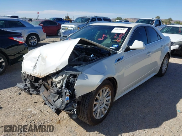 2013 Cadillac CTS Luxury with VIN 1G6DF5E51D0165324, listed as a IAAI auction lot 42099692 with 163,758 mi miles and . Bid and sale history available at DreamBid. Image 2.