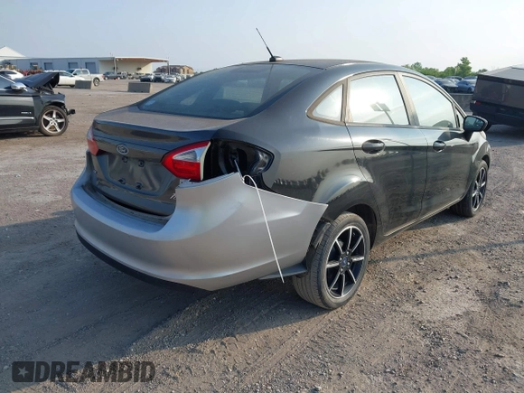 2018 Ford Fiesta SE z VIN 3FADP4BJXJM117051, wystawiony jako IAAI lot #42049956 z przebiegiem 27 367 mil mil oraz . Historia ofert i sprzedaży dostępna na DreamBid. Obrazek 4.