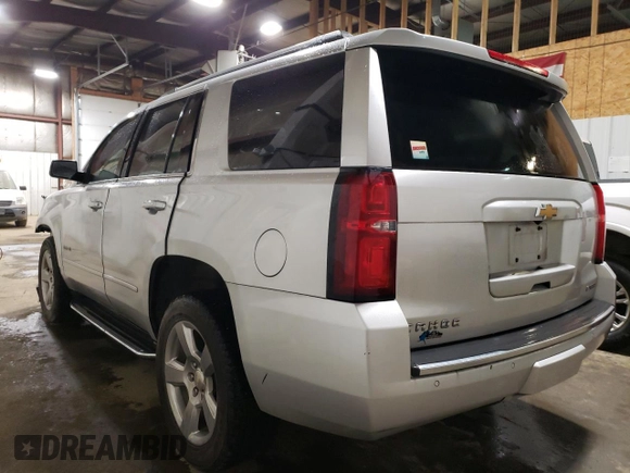 2018 Chevrolet Tahoe Premier with VIN 1GNSKCKCXJR160533, listed as a Copart auction lot 55648025 with 102,243 mi miles and Salvage title. Bid and sale history available at DreamBid. Image 2.