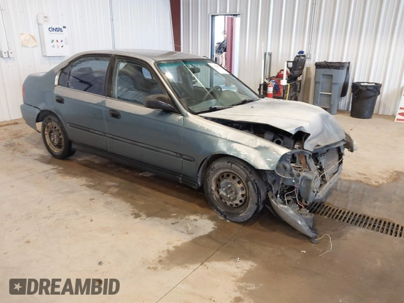 1998 Honda Civic DX with VIN JHMEJ6622WS000401, listed as a IAAI auction lot 41588057 with 296,638 mi miles. Bid and sale history available at carsss.com. Image 1.