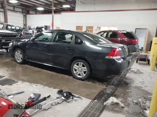 2016 Chevrolet Impala LT with VIN 2G1WB5E36G1186557, listed as a IAAI auction lot 41028346 with 106,856 mi miles and . Bid and sale history available at DreamBid. Image 3.